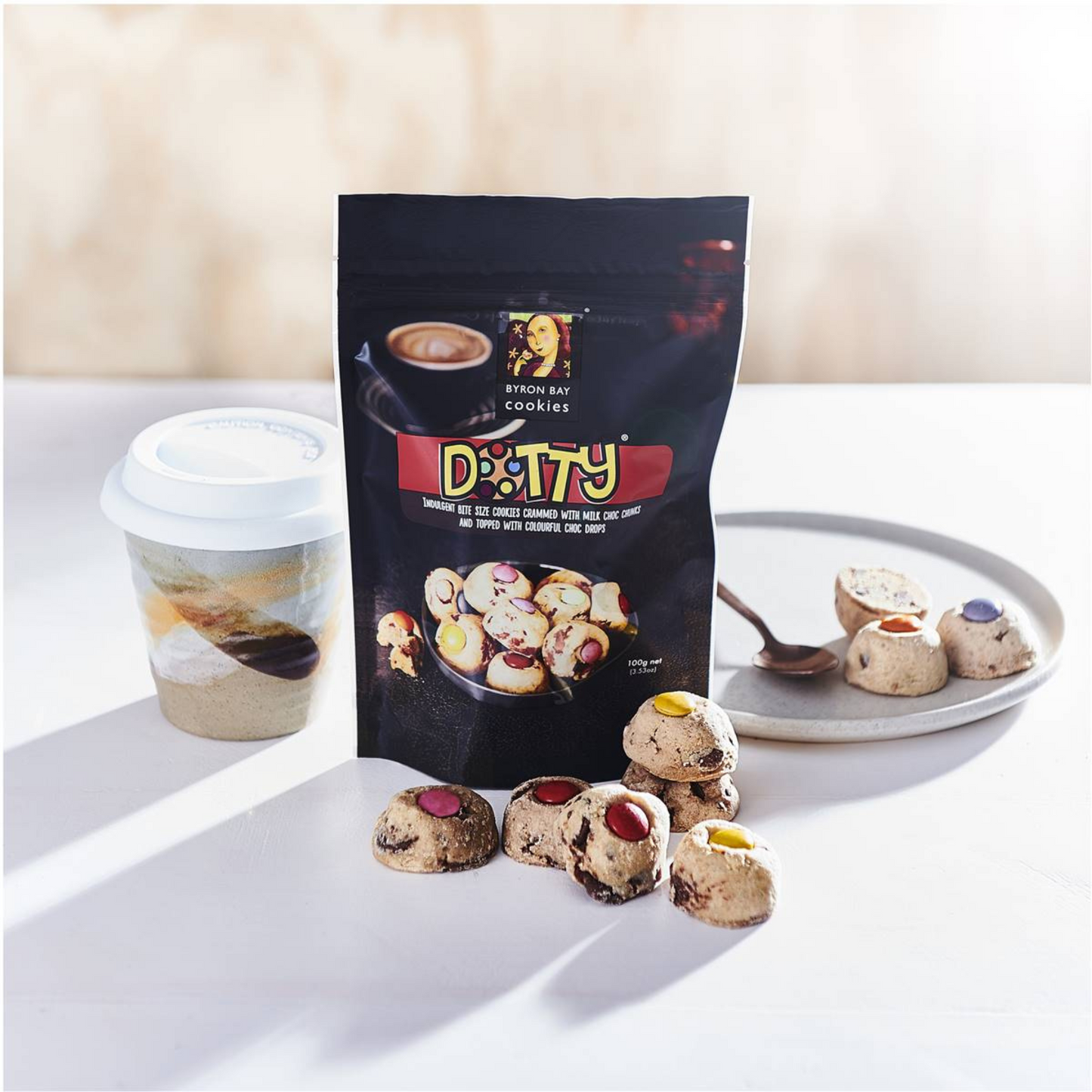 Byron Bay Cookies Dotty Cookie Bites are best described as indulgent bite size cookies crammed with milk choc chunks & topped with colourful choc drops. Halal certified. Best imported foreign genuine authentic real snack Australian Aussie premium quality sweets healthy biscuits cheap price in Dhaka Bangladesh.